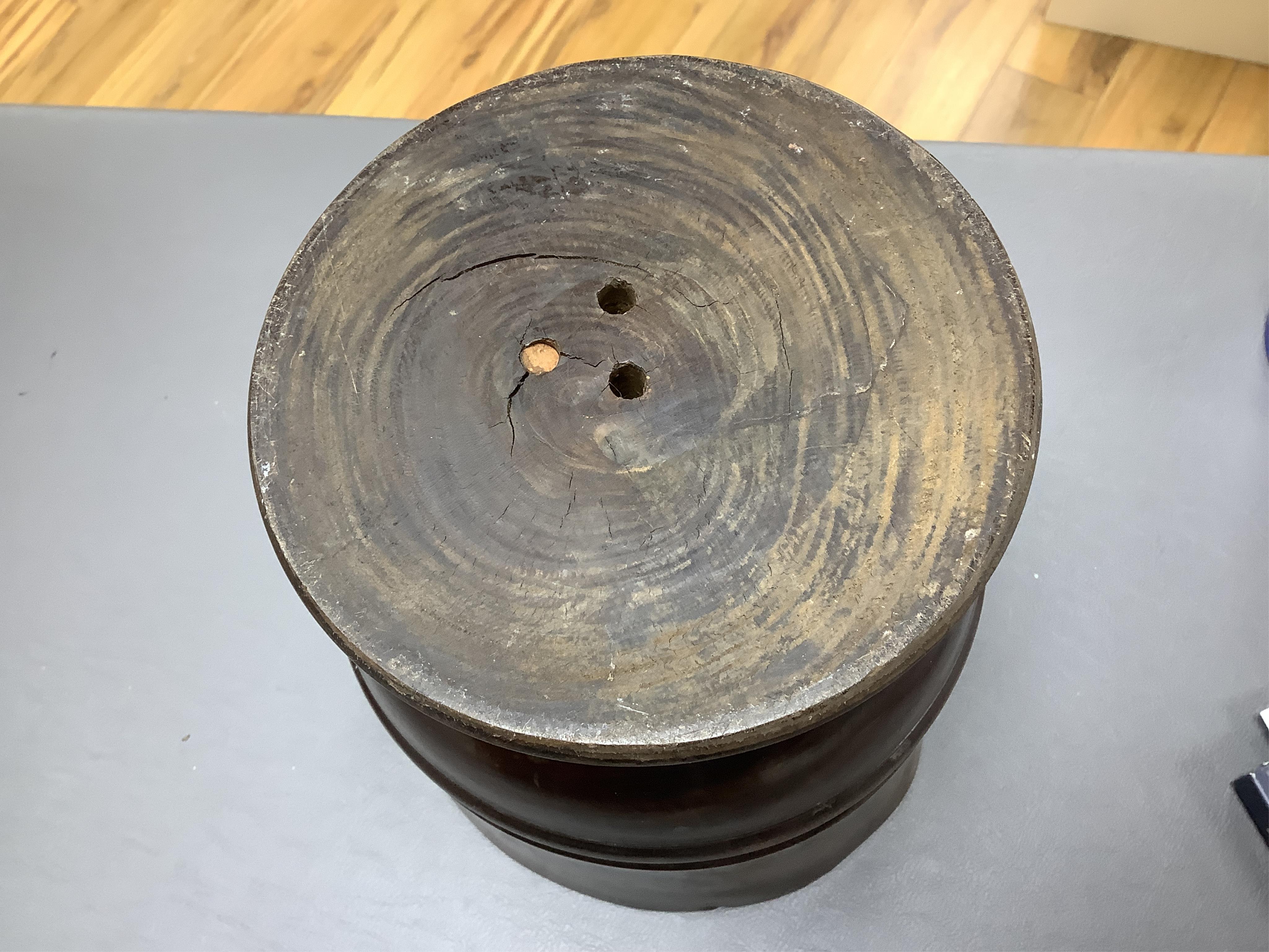 An 18th/19th century lignum vitae wassail bowl and a circular mahogany tobacco box, largest 18cm high